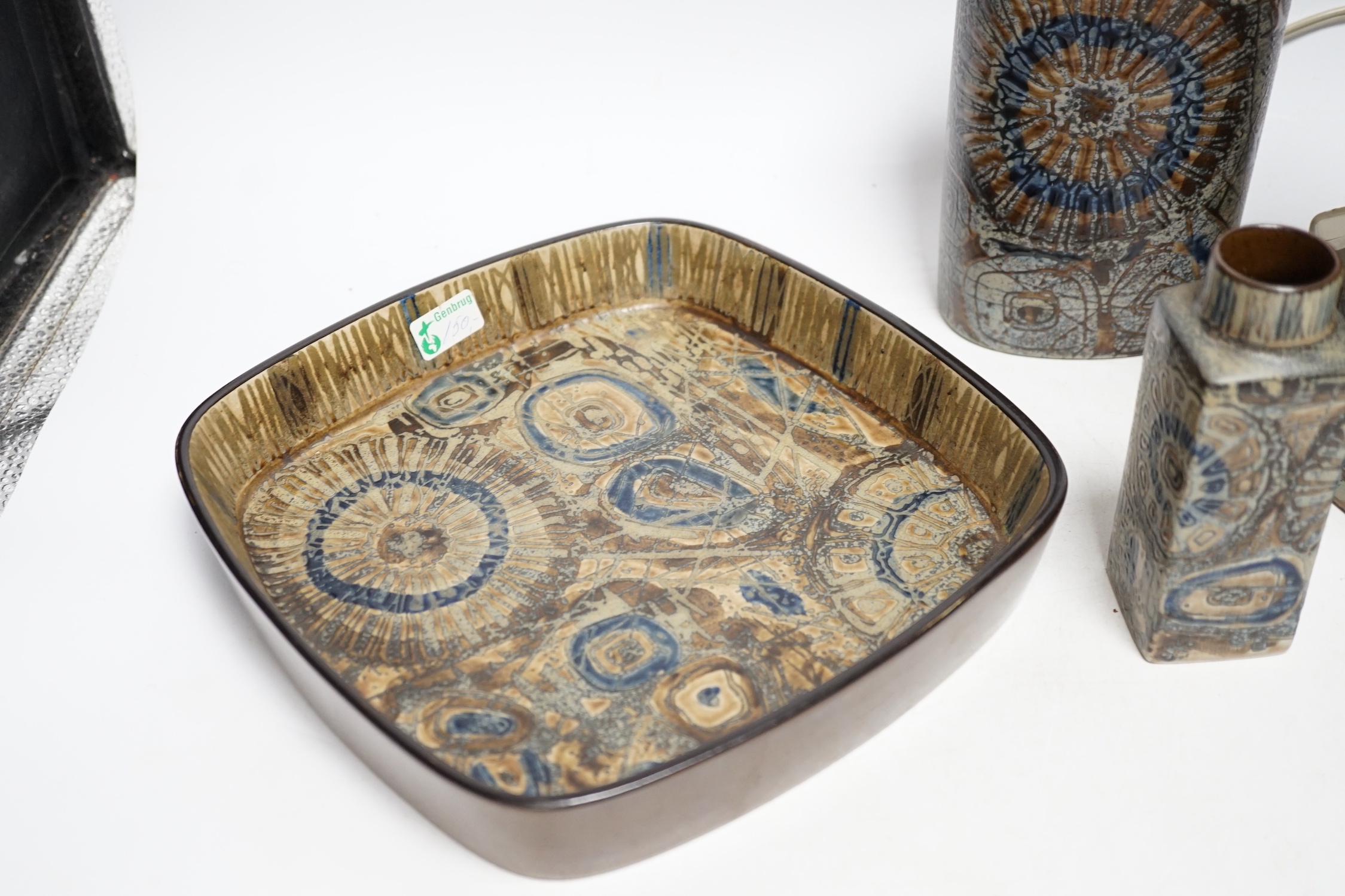 Five Royal Copenhagen fajance items; a lamp, two vases, and two shallow dishes, tallest 29cm